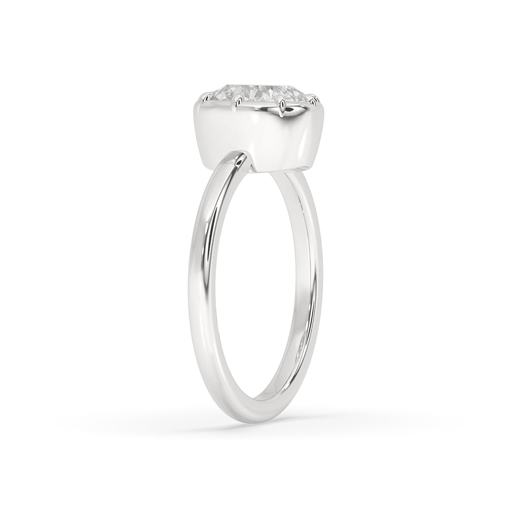 8 prong diamond ring with claw prong ring setting on a white gold band.
