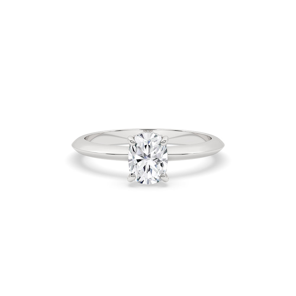 Cushion Cut Engagement Ring with sparkling diamonds in a white gold setting.
