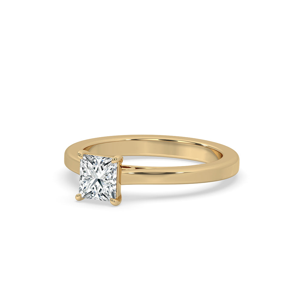 A stunning yellow gold ring with a Princess Cut Solitaire Ring and a Lab Grown Diamond center stone.
