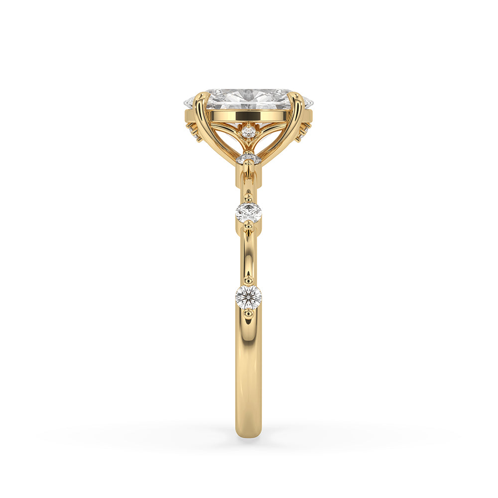Yellow gold ring placed beside a jewelry box.