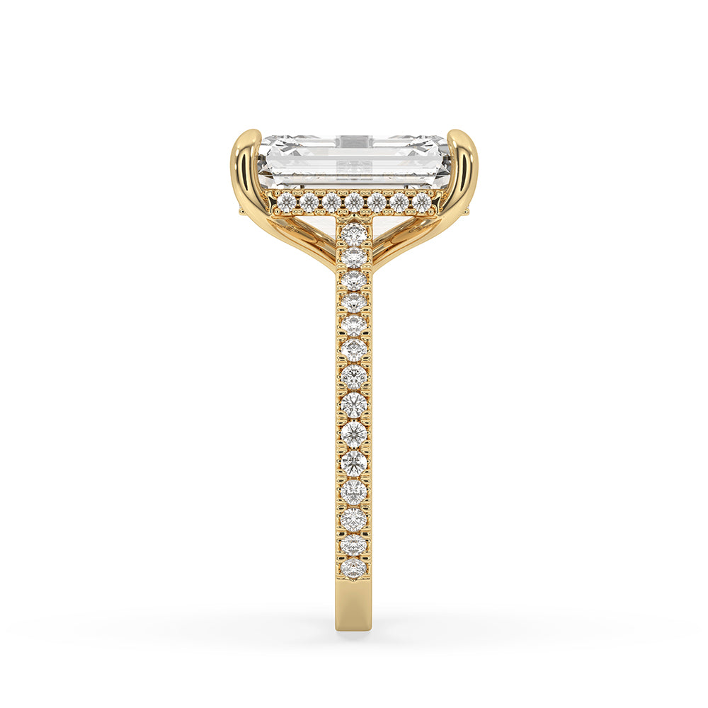 Yellow gold diamond ring with 4 prong claw setting.