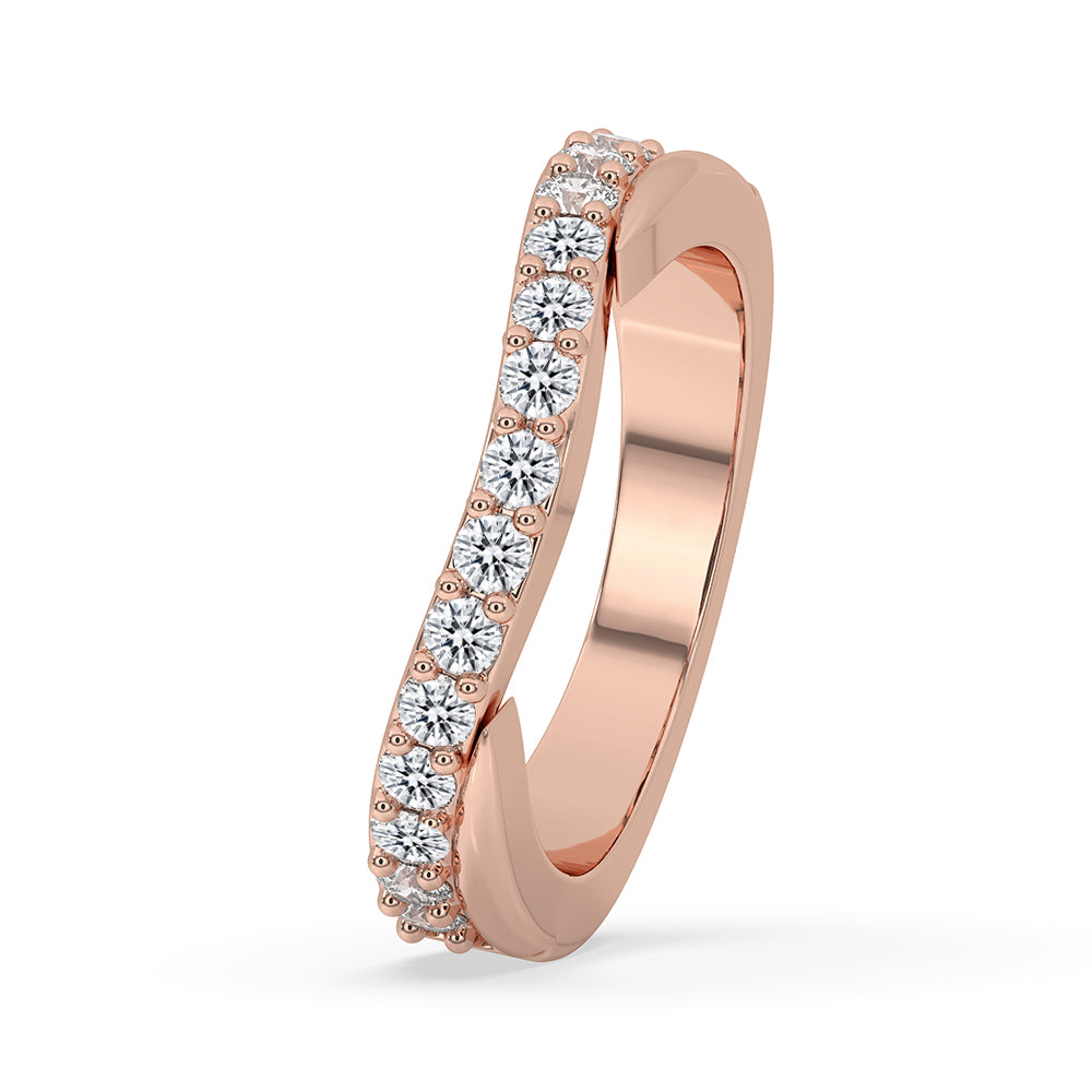 Stackable wedding band featuring a custom design in rose gold.
