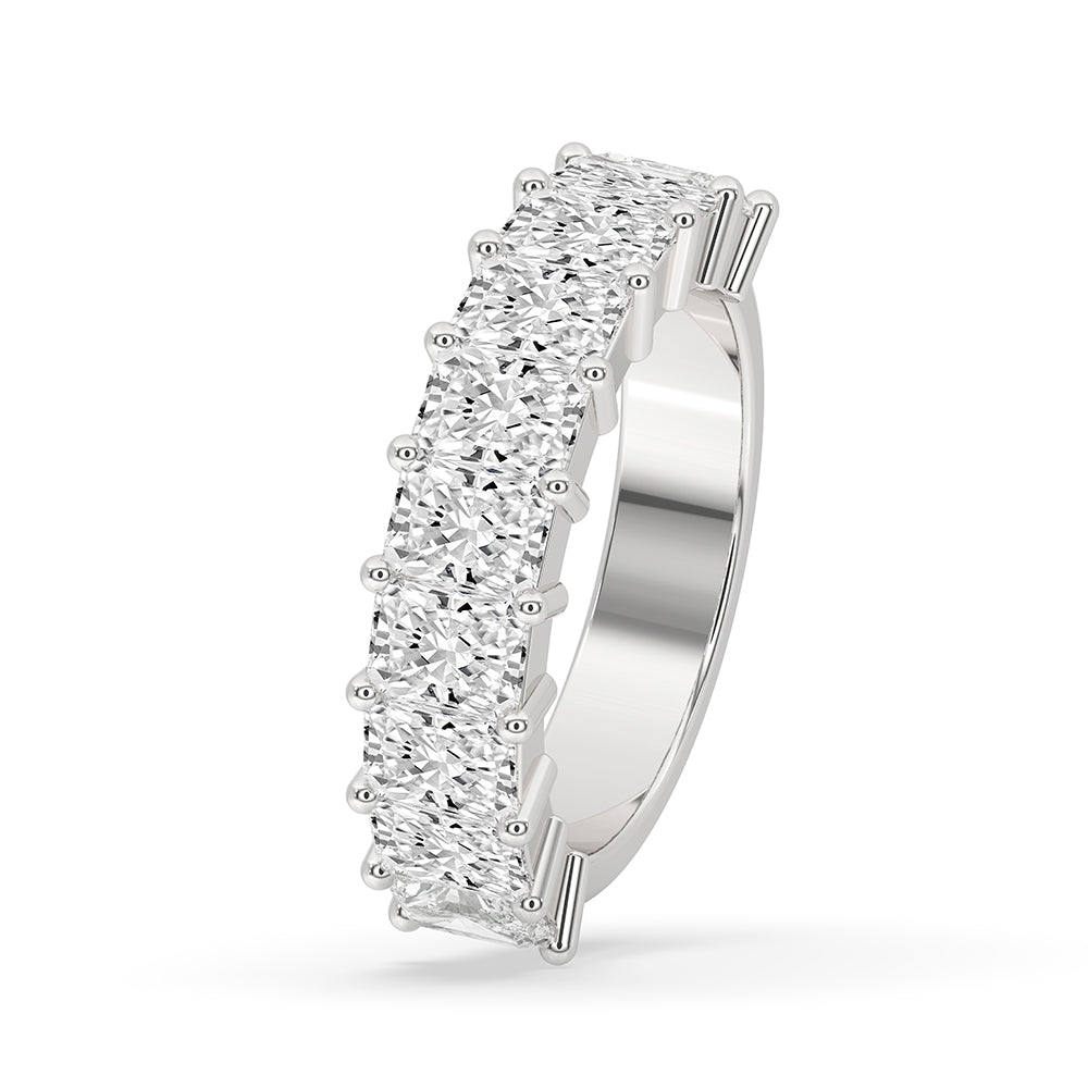 Prong set band designed in Emerald Cut Eternity Band with custom wedding band style.
