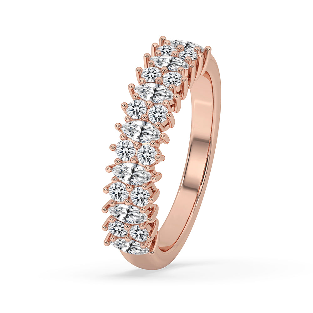 Rose gold band featuring shared prong full eternity marquise and round cut diamonds.

