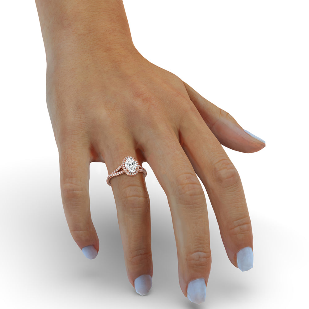 Oval diamond engagement ring with a split shank design for a modern and sophisticated look.