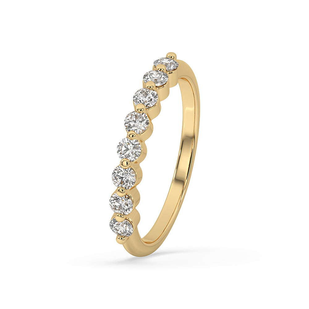 Yellow gold wedding band with a polished, smooth finish for a classic look.

