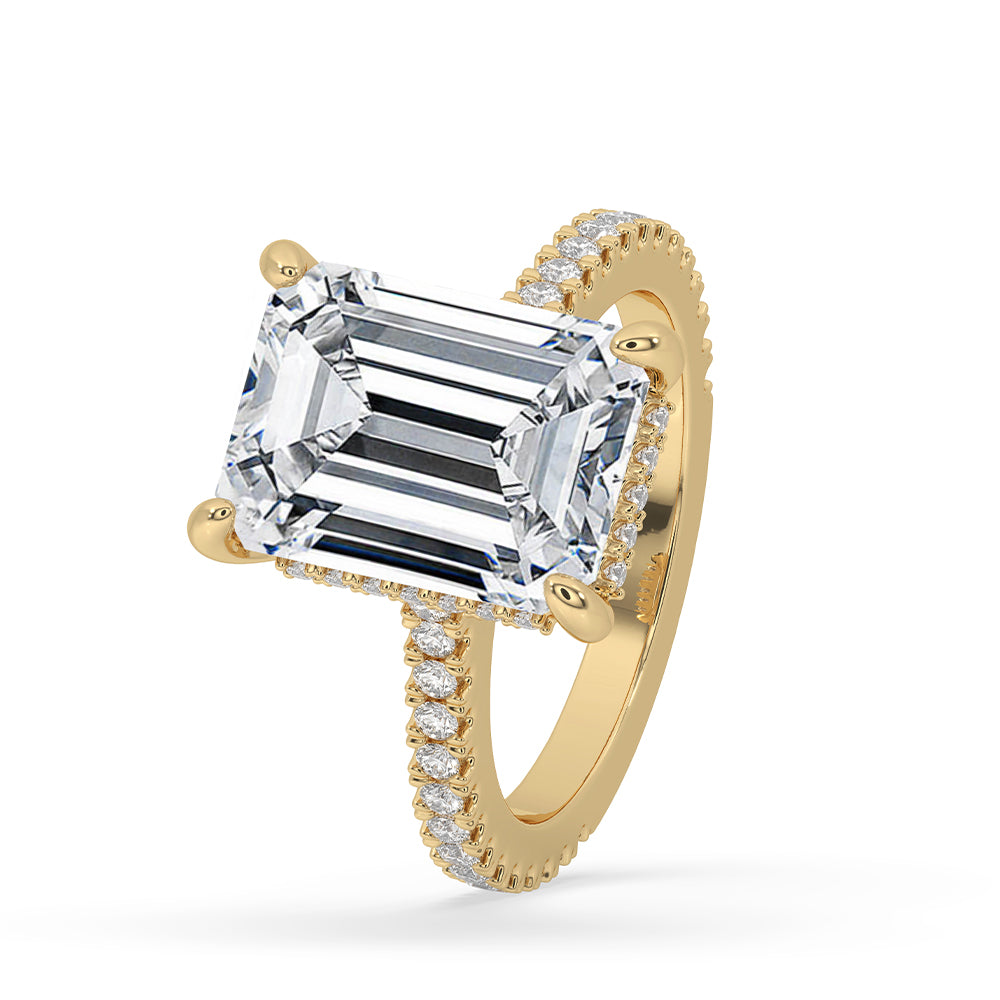 Hidden halo diamond ring featuring round cut diamond.