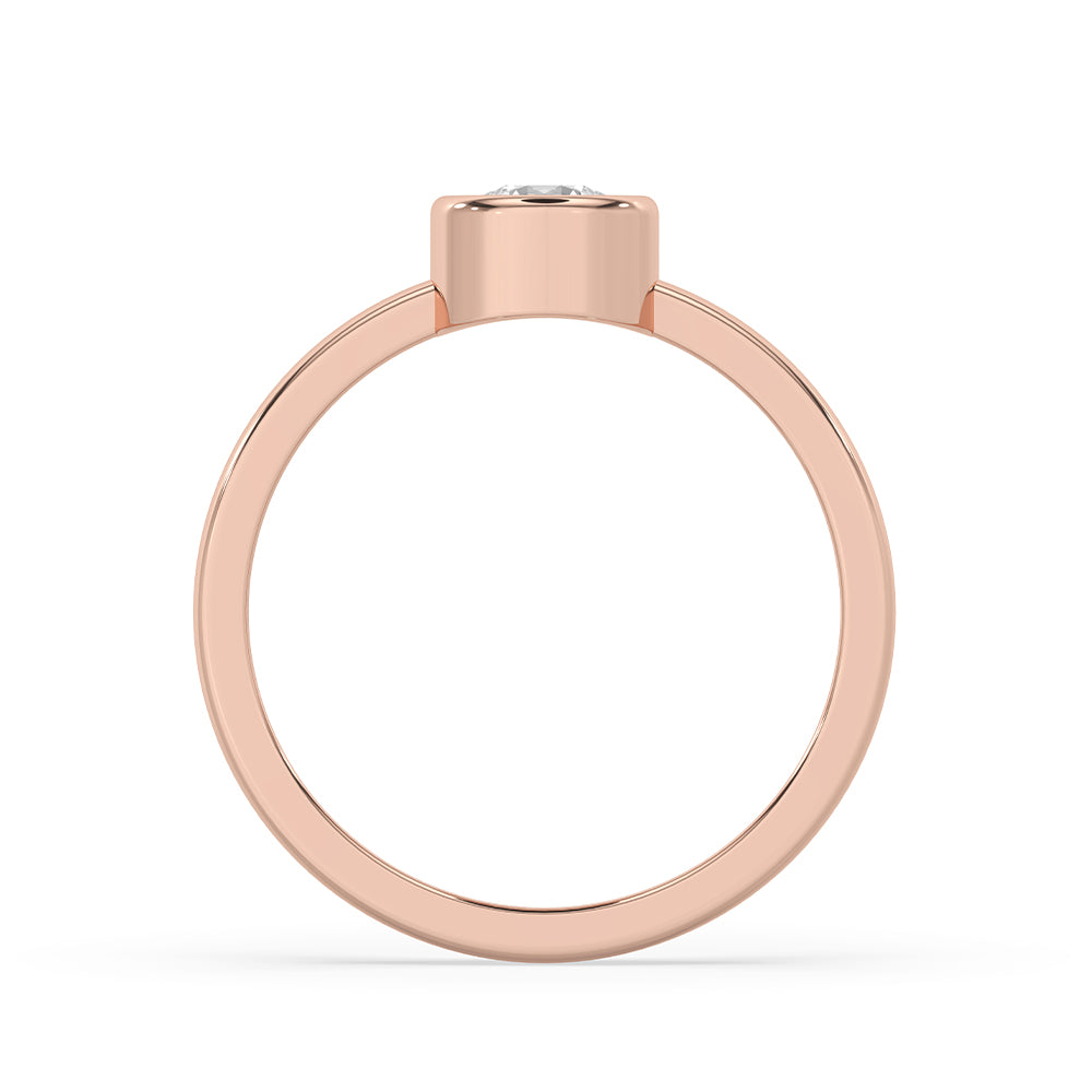 Handmade ring placed on a marble surface for product display.