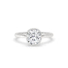 Bezel set diamond ring in white gold with cushion cut diamond design.
