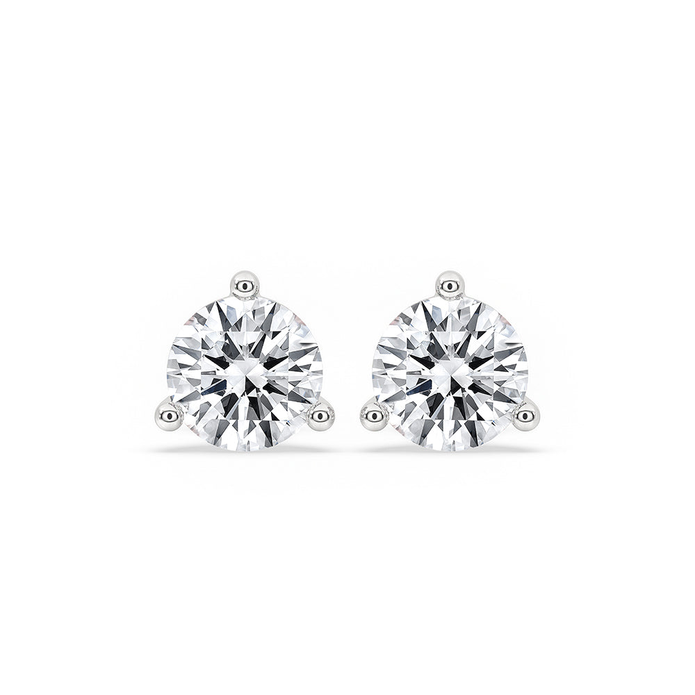 Round diamond stud earrings crafted with care.
