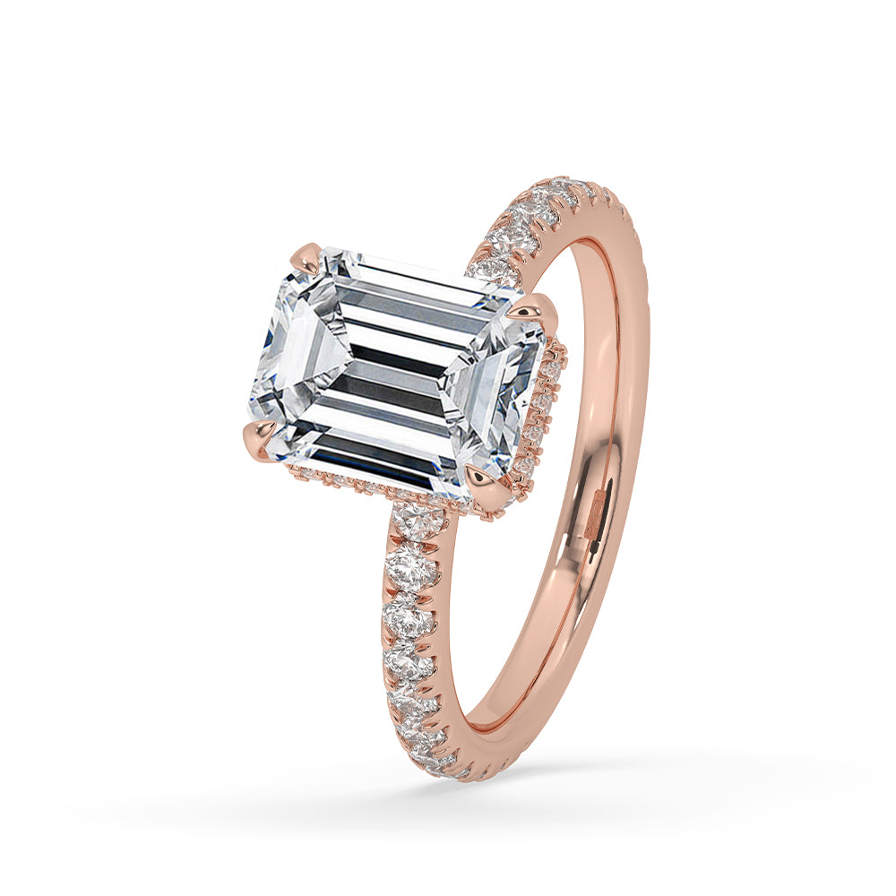 Rose gold ring with custom design and a sparkling pave setting.