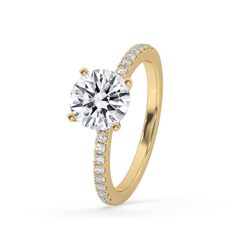 Handmade round cut engagement ring featuring a Lab Grown Diamond.
