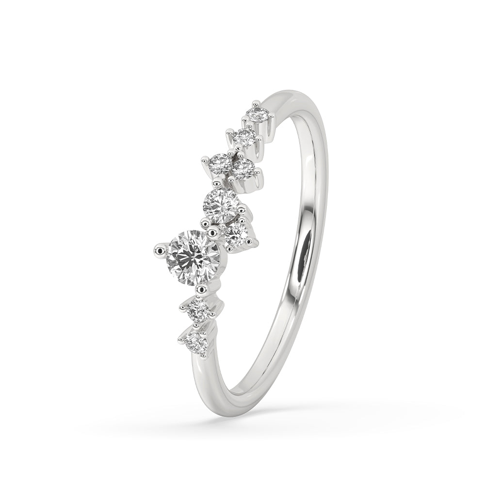 Handmade jewelry featuring a prong set wedding band with round cut diamonds.
