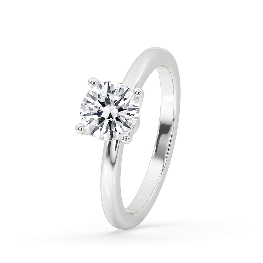 Simple engagement ring with 4-prong setting.
