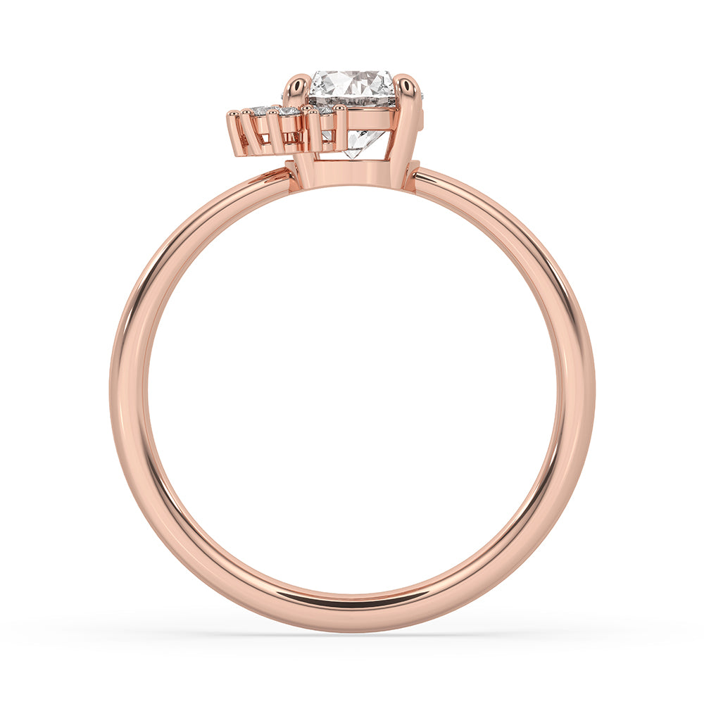 Elegant round cut half halo ring with a prong setting, set in rose gold for an exquisite look.
