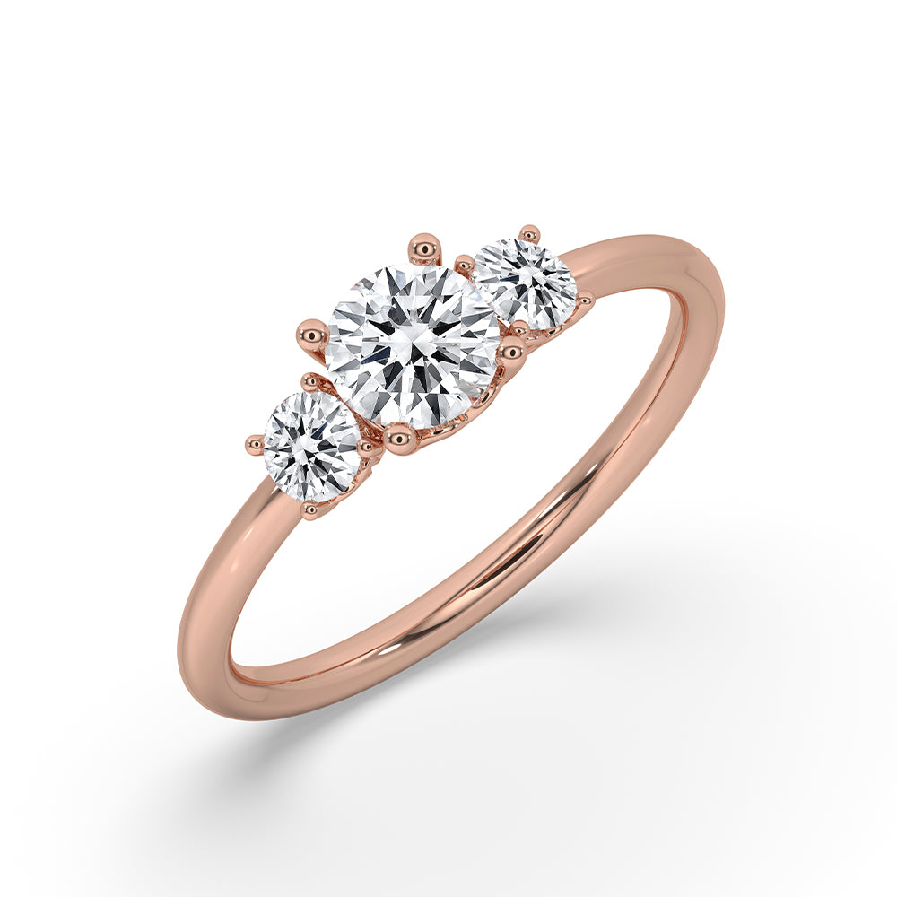 3 stone diamond ring featuring lab grown diamonds.
