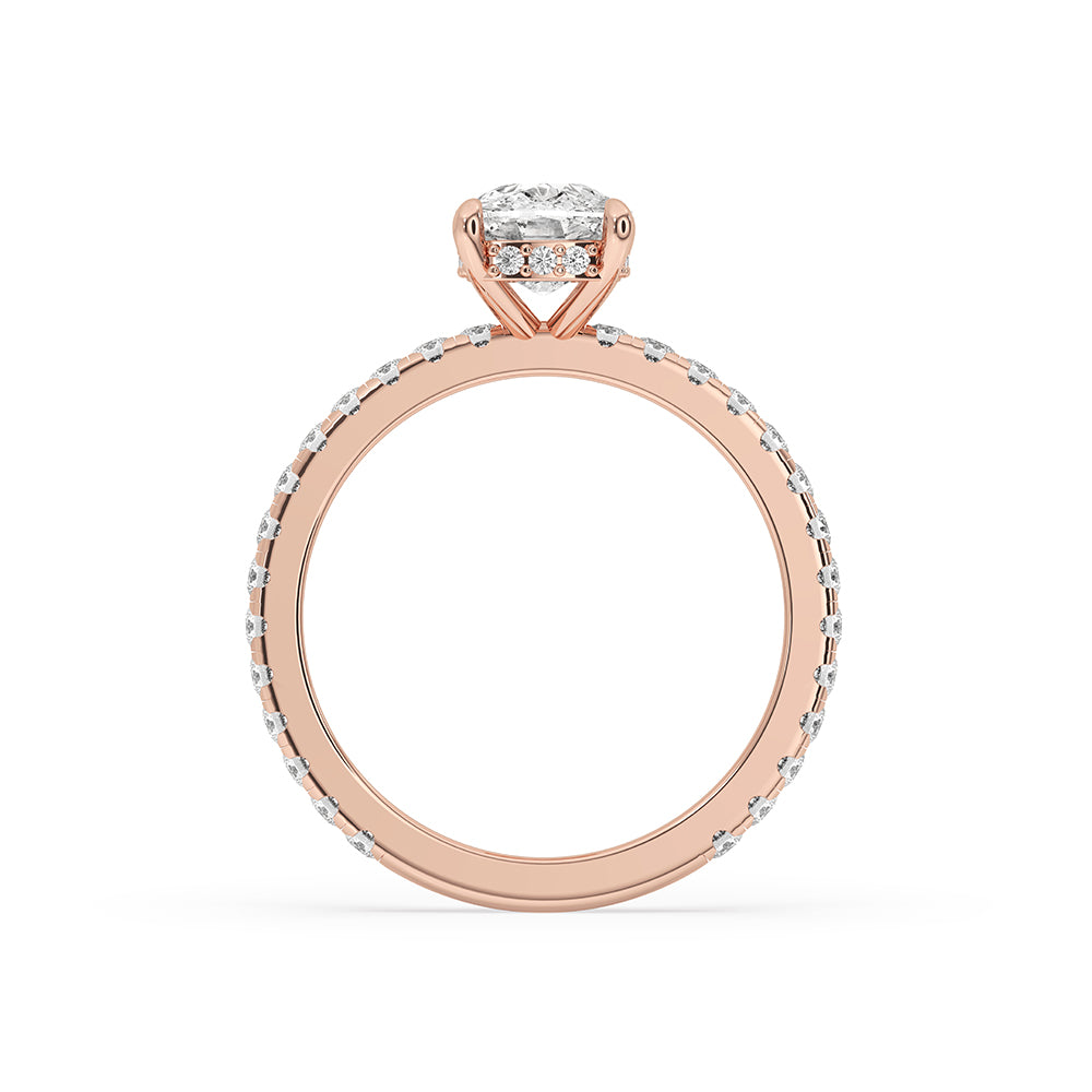 Pave set diamond ring with a stunning cushion cut center stone and hidden halo setting.
