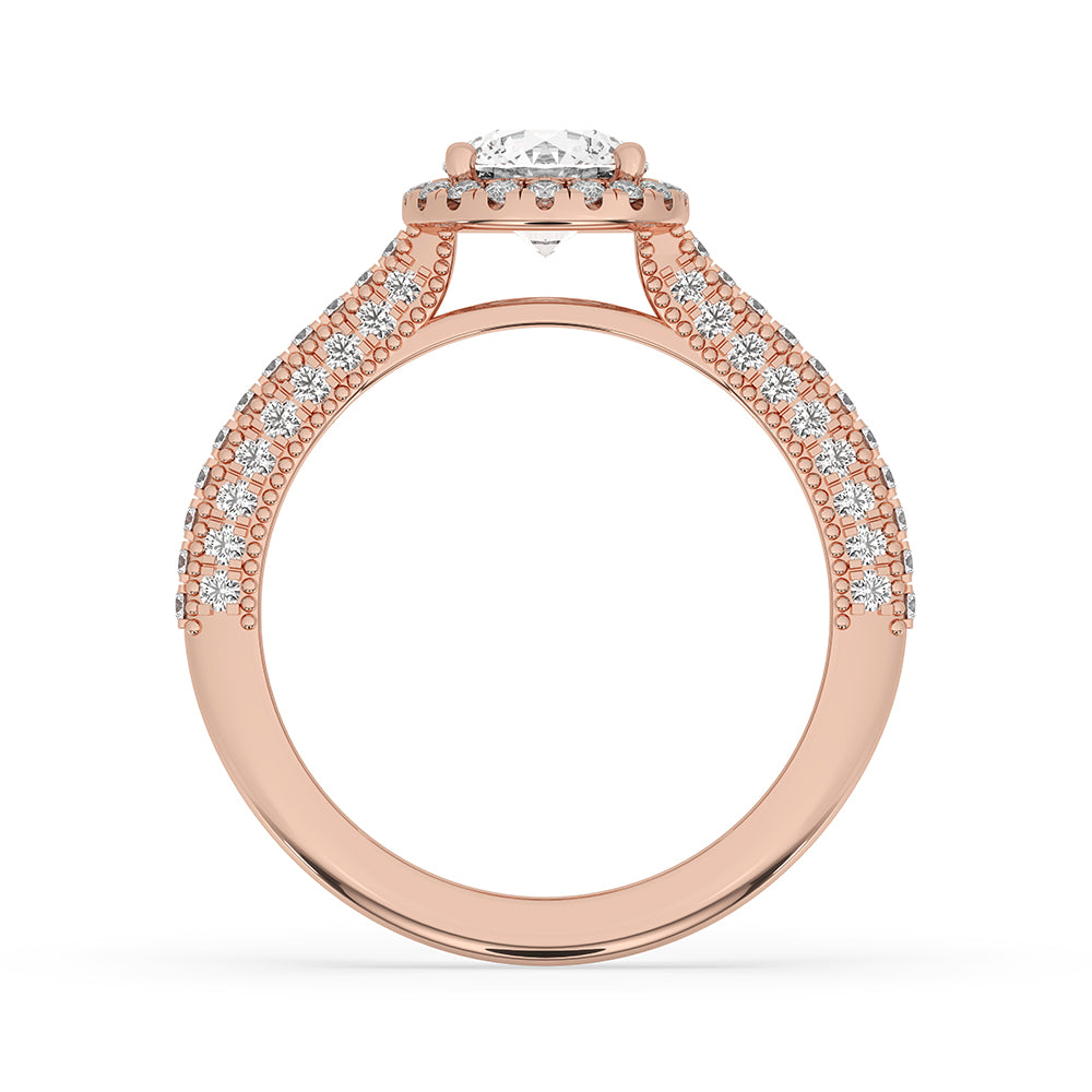 Halo round cut ring set with a matching band, perfect for a complete bridal look.
