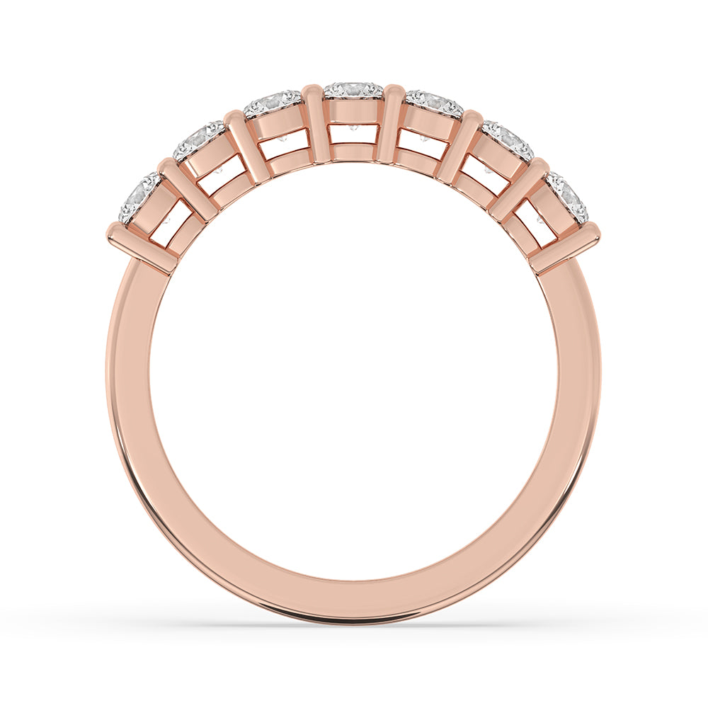 Rose gold band crafted as 7 Stone Diamond Band from carat diamonds band collection.
