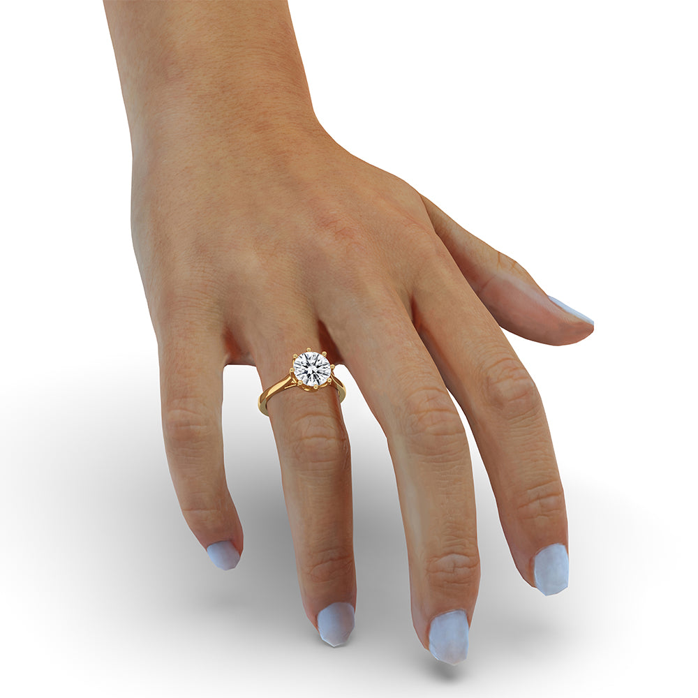 Carat diamonds engagement ring in a cathedral setting.
