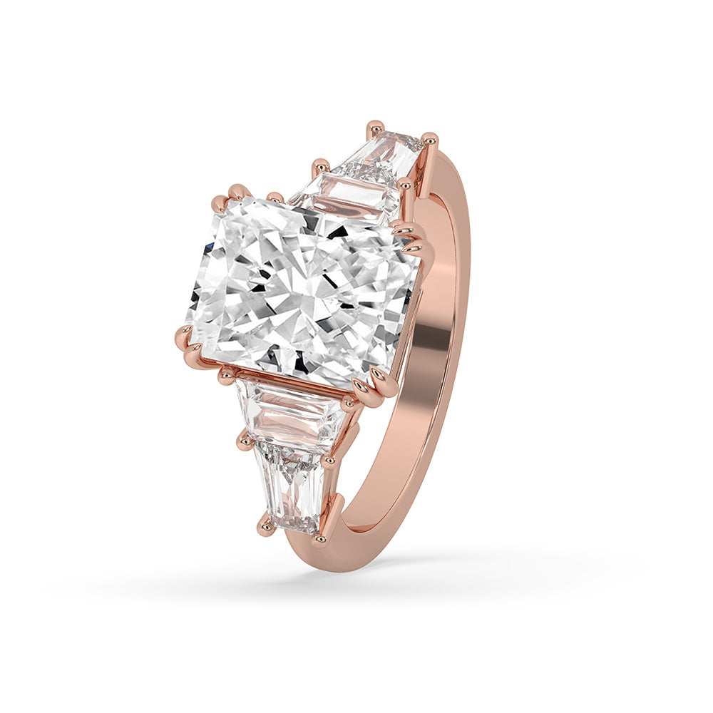 Trapezoid Side Stone Engagement Ring with Tapered Baguette Diamonds.
