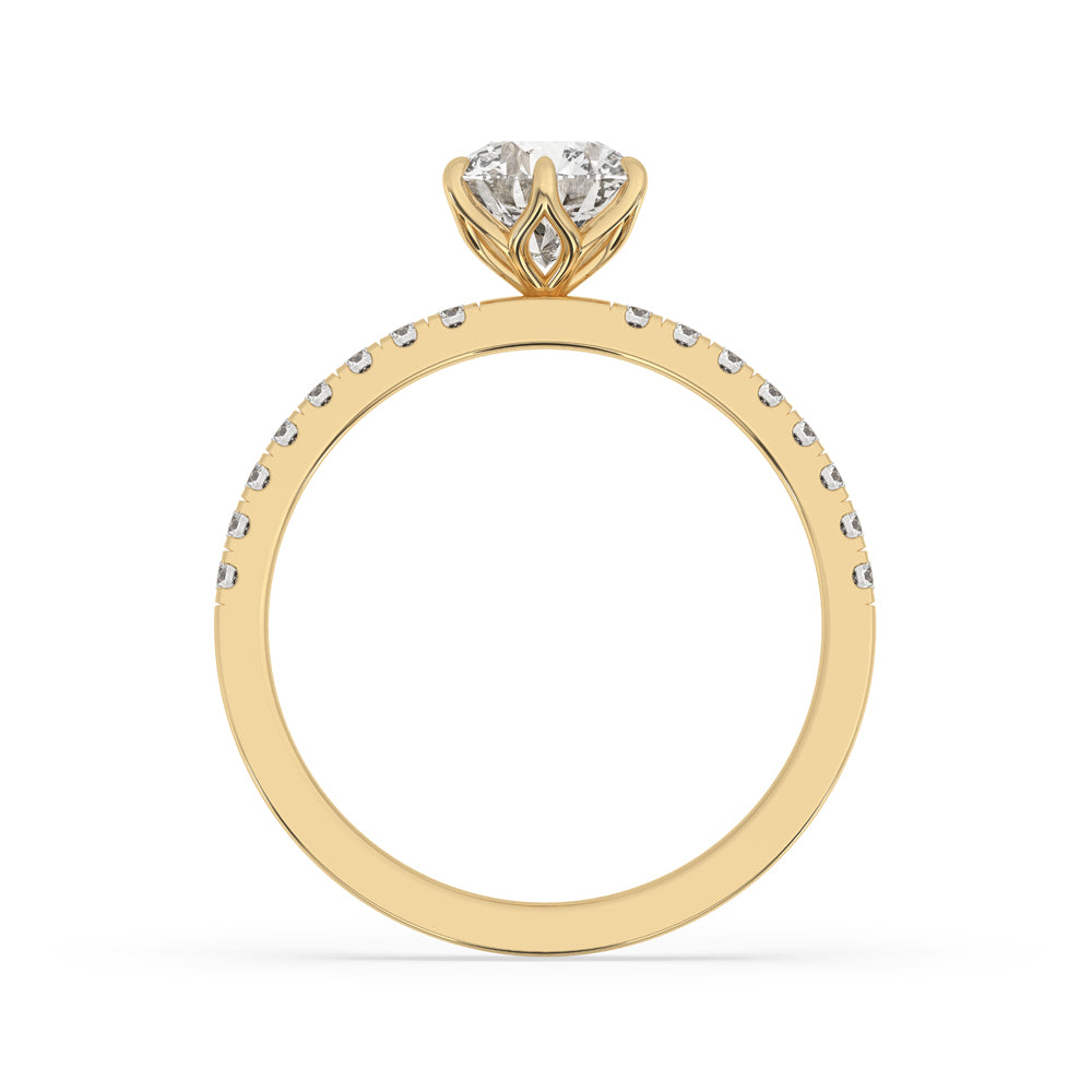 Buy engagement ring with a round cut diamond in a pave setting, crafted in yellow gold.
