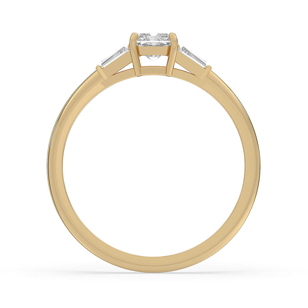 Custom engagement ring with tapered baguette side stones and a radiant cut diamond.
