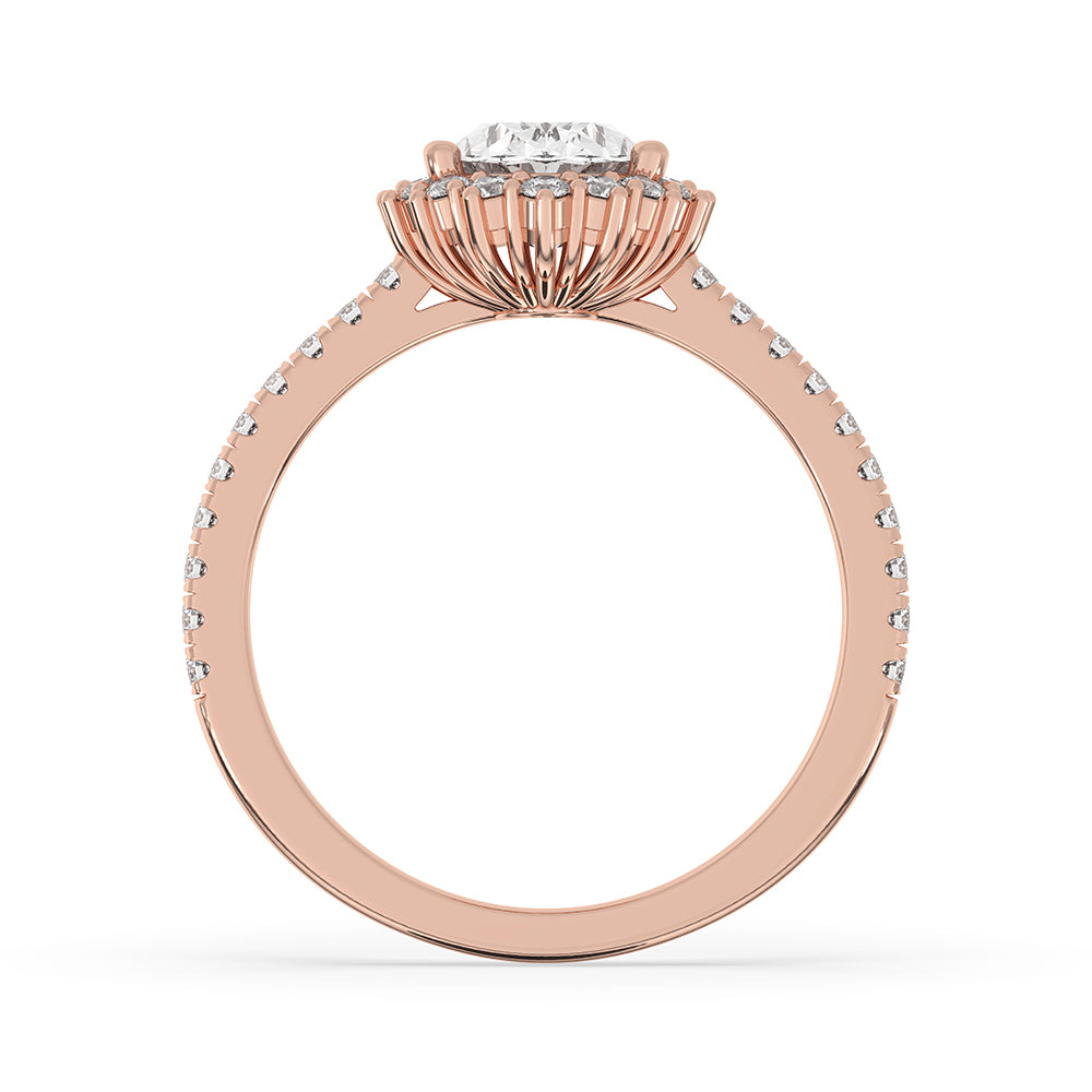 Round cut pave setting ring, designed to highlight the diamond’s brilliance.
