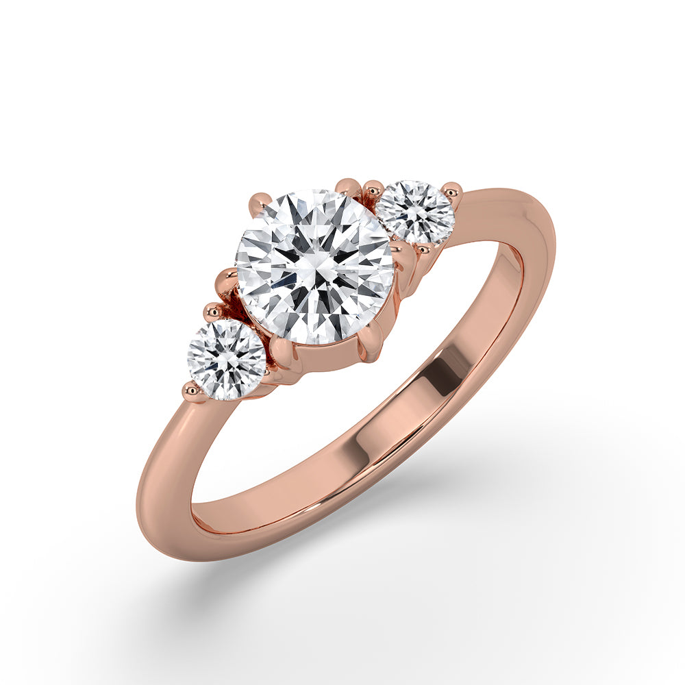 Handmade rose gold ring with three IGI certified diamonds.
