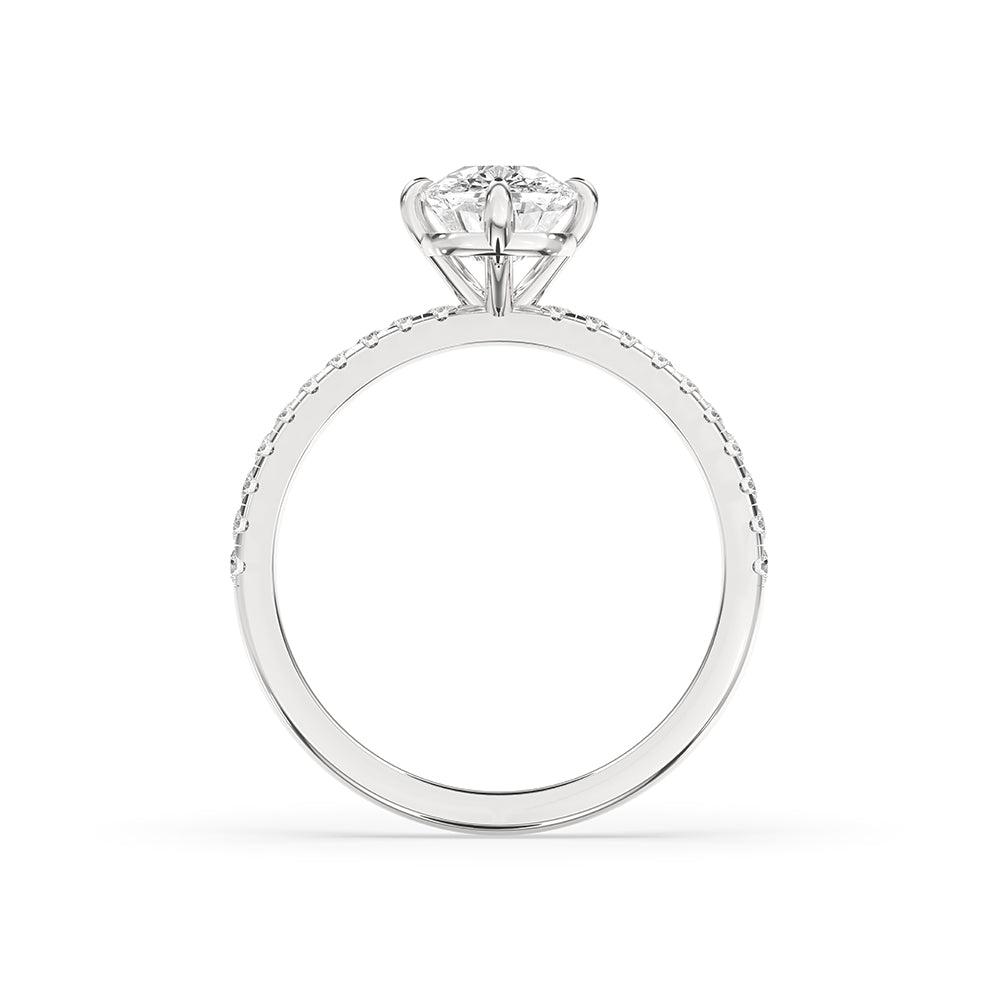 Elegant handmade jewelry with a carat diamond in a white gold pave ring setting.
