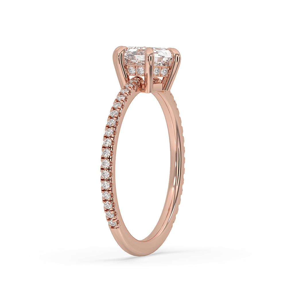 Round cut pave set engagement ring crafted in rose gold for a warm glow.
