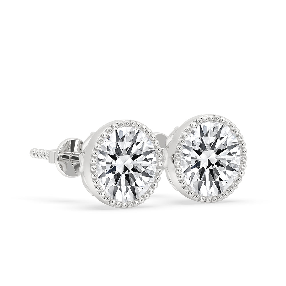 Milgrain earrings with vintage detail and handcrafted charm.
