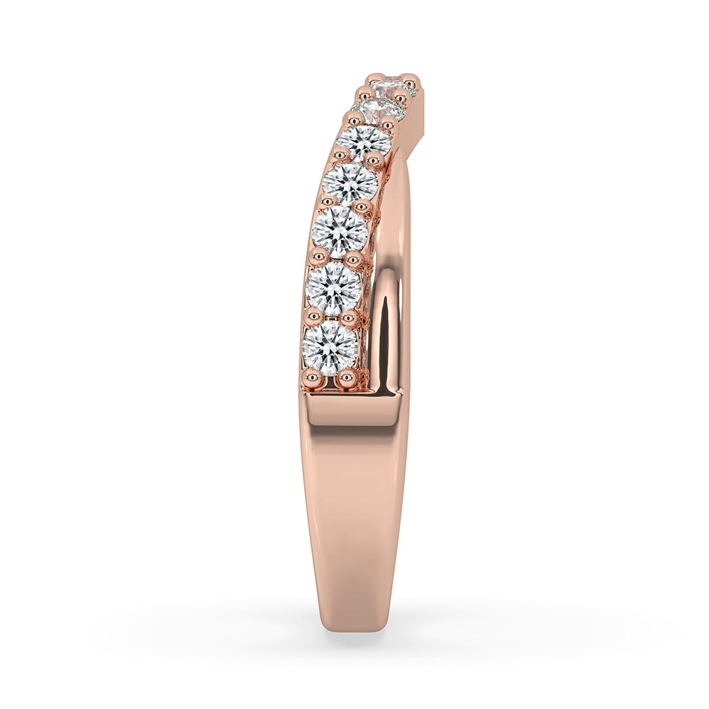 Handmade band with carat diamonds and a curved shape.
