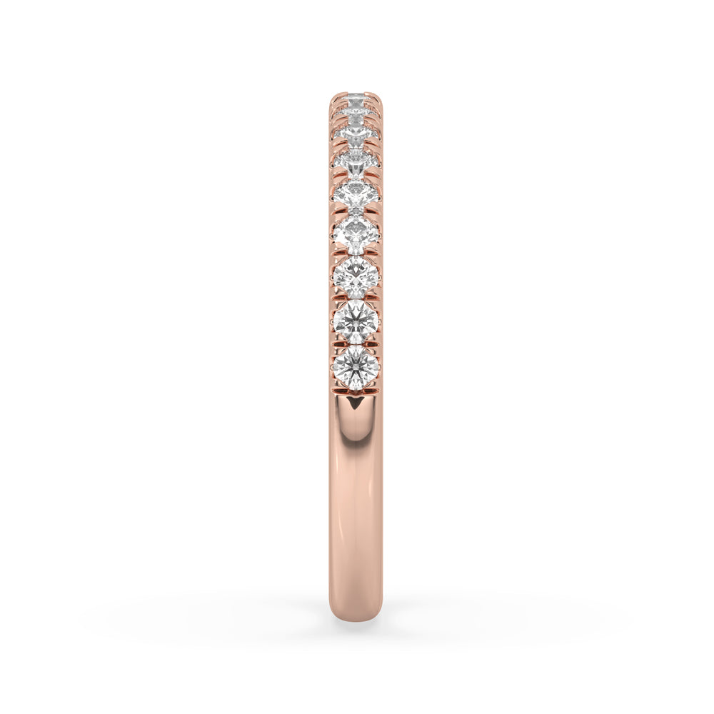 Elegant half eternity wedding band crafted with precision and adorned with dazzling stones.

