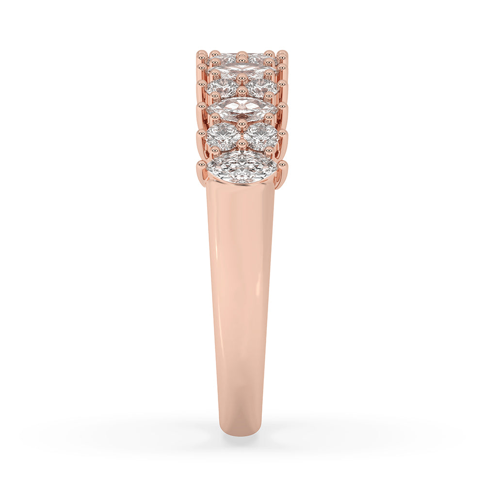 Custom wedding band with shared prong marquise and round cut diamonds in rose gold.
