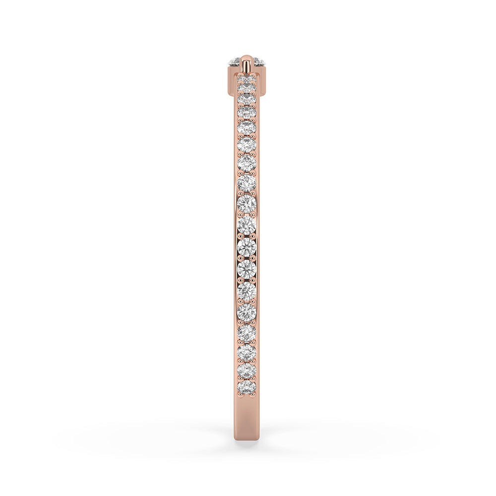 Carat Diamonds wedding band with round and marquise diamonds.
