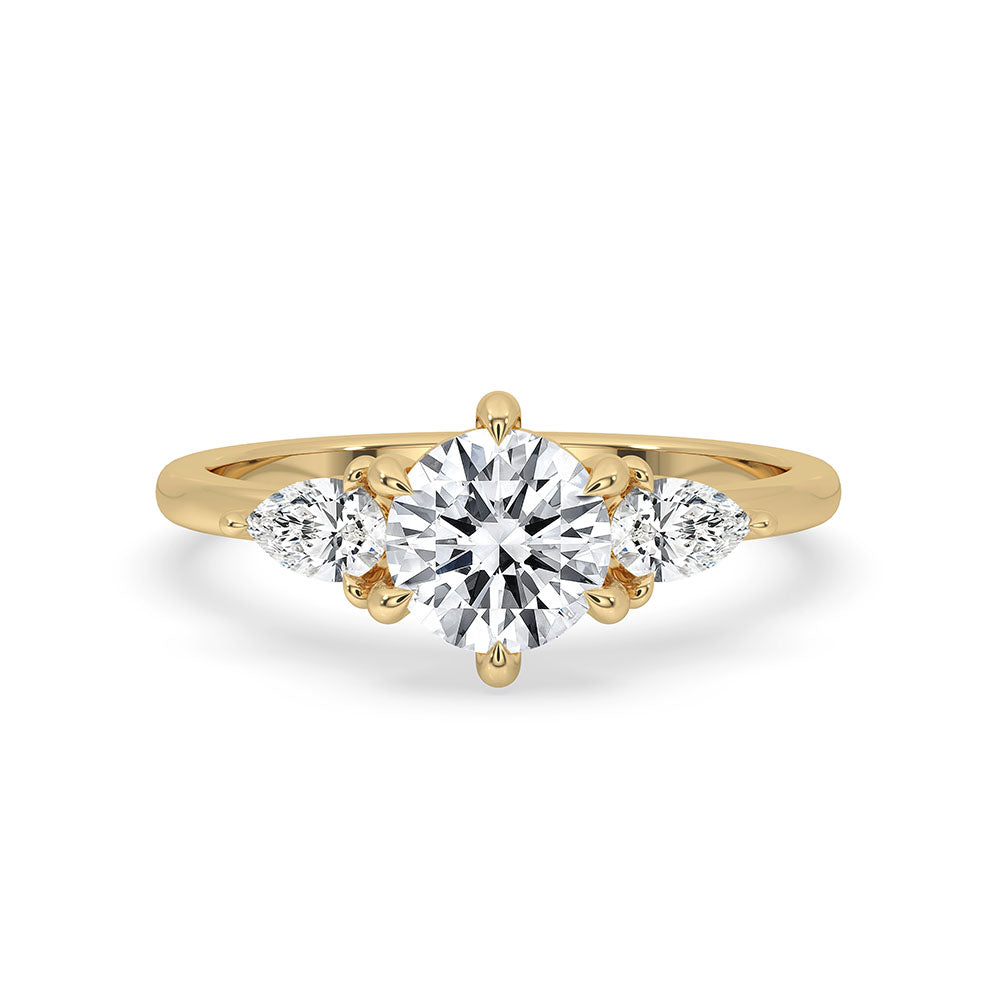 3 Stone Pear Diamond Ring set in a classic prong setting on a yellow gold band
