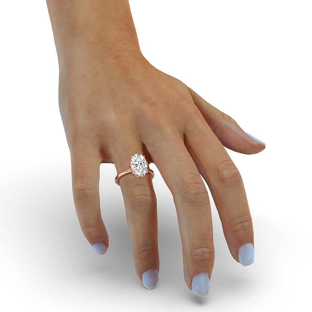 Rose gold ring with a classic solitaire diamond.
