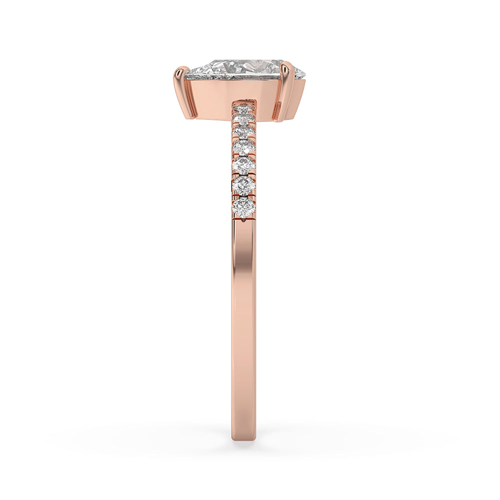 Round cut pave engagement ring with a handcrafted finish.
