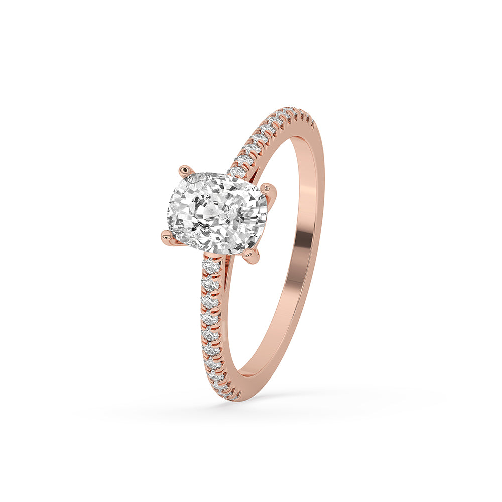 Round cut pave engagement ring featuring a Lab Grown Diamond in an IGI certified prong setting.
