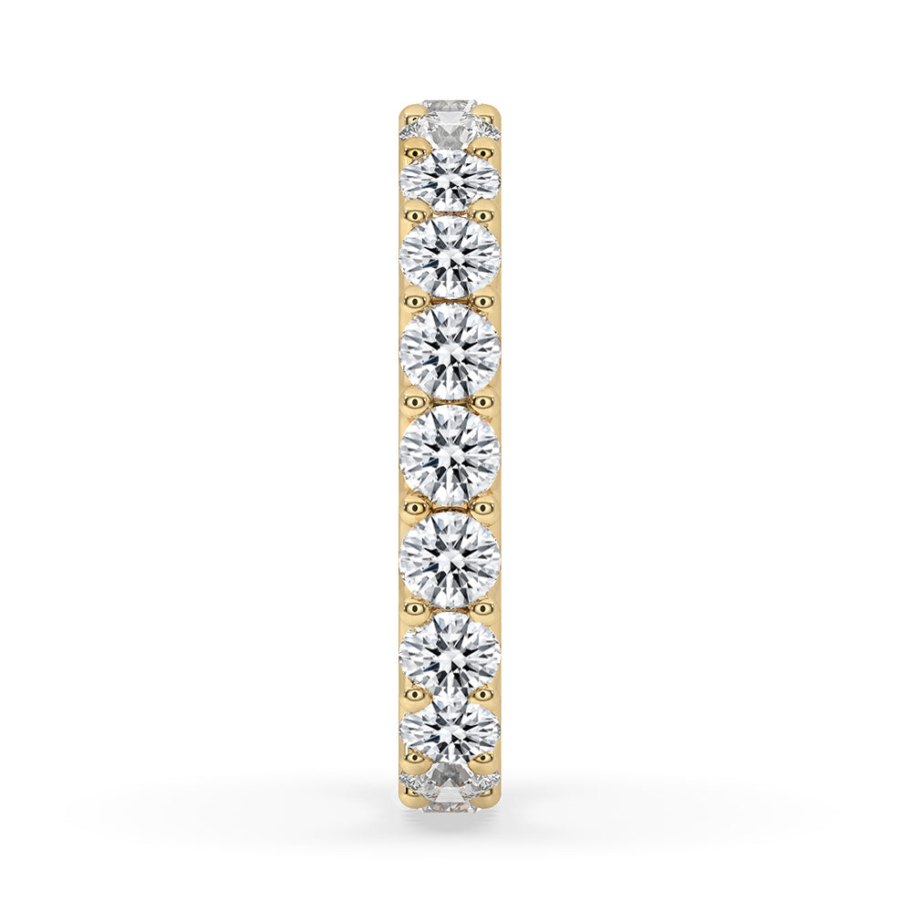 Round cut diamond band designed in a traditional yellow gold finish.
