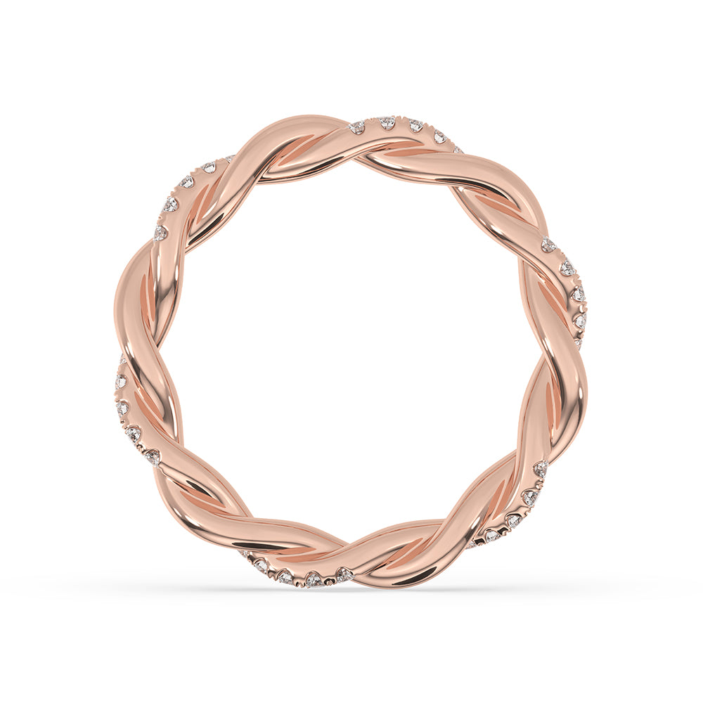 Handmade band featuring a round cut diamond for a delicate wedding look.
