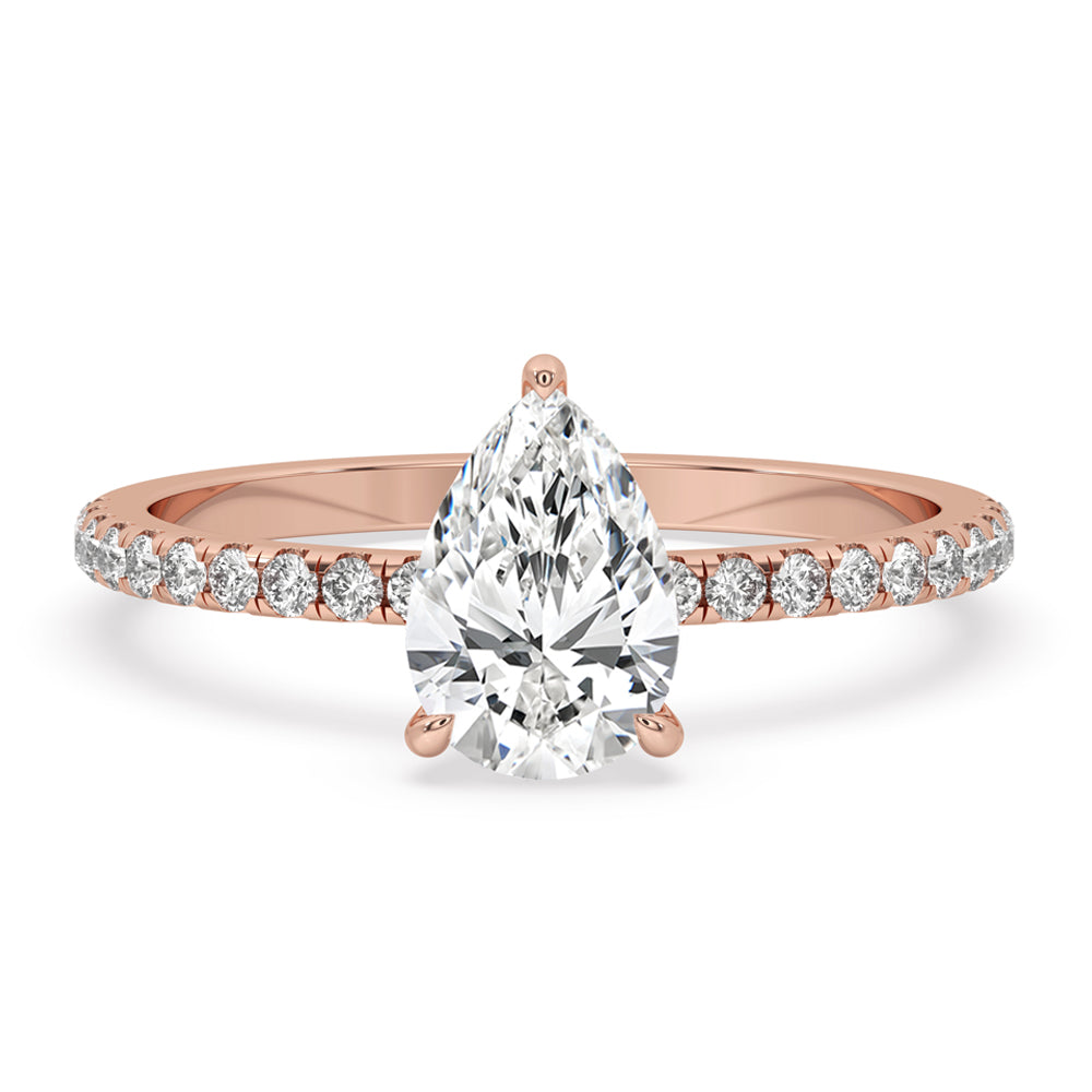Elegant Pear Shape Engagement Ring with hidden halo setting, perfect for a timeless look.