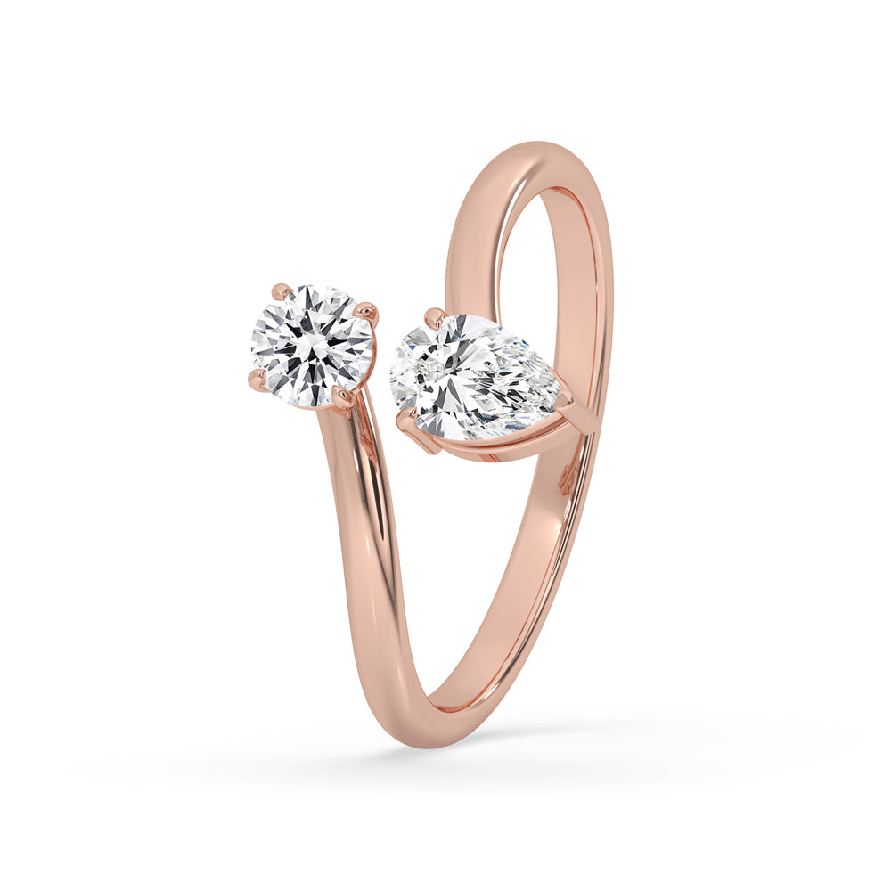 2 stone diamond ring with a 3 prong pear engagement design, crafted by hand.