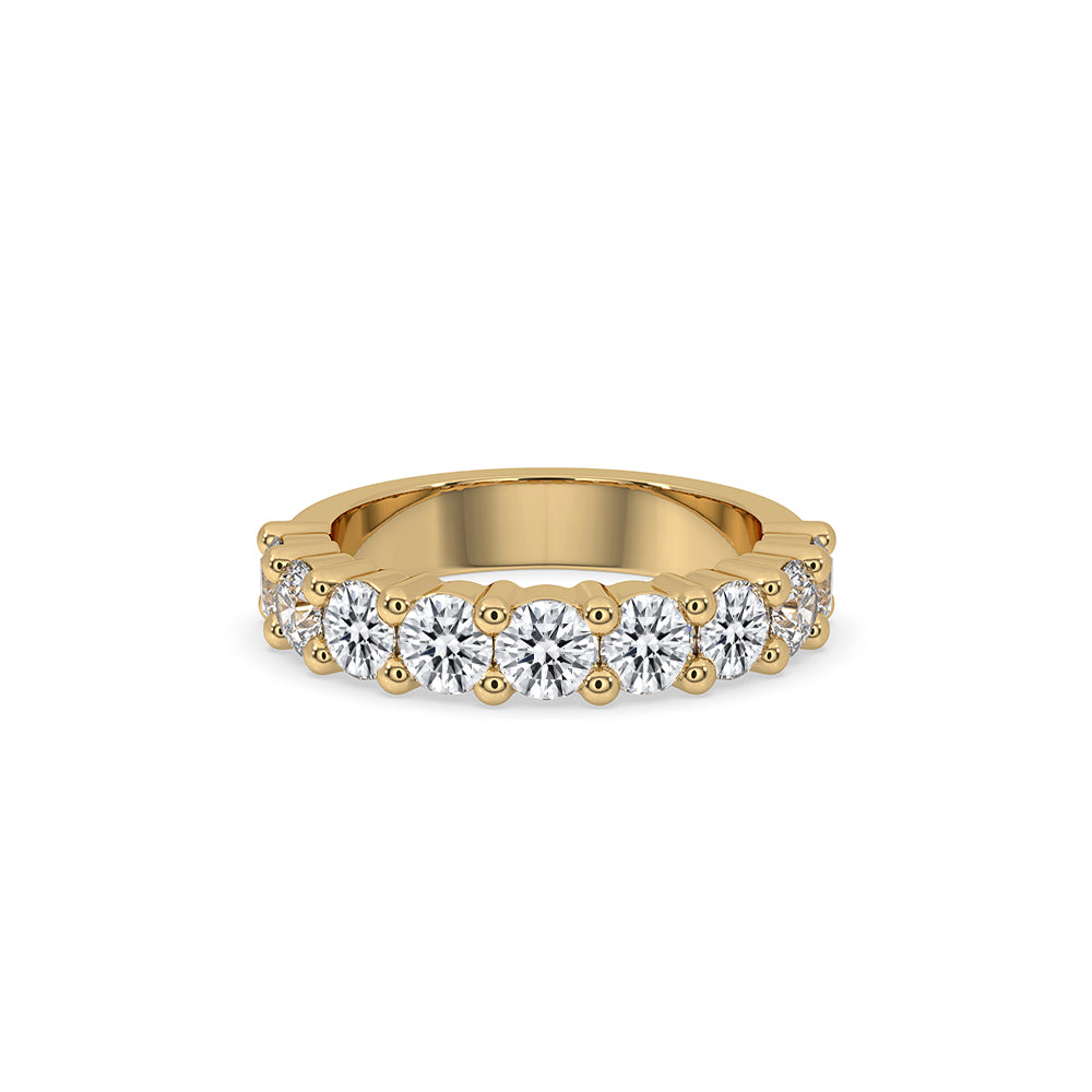 Round cut wedding band in yellow gold.

