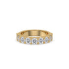 Round cut wedding band in yellow gold.
