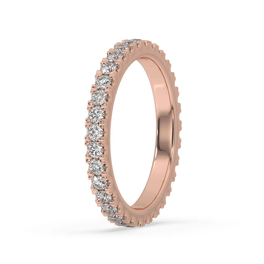 Full eternity band showcasing sparkling diamonds all around.
