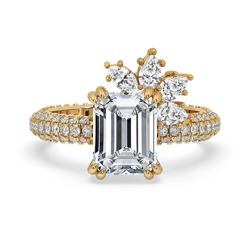 Emerald Diamond Ring with Three Side Pave Set Design in Yellow Gold.
