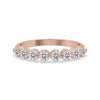 Shared Prong Eternity Band designed with round cut diamond band and rose gold band.
