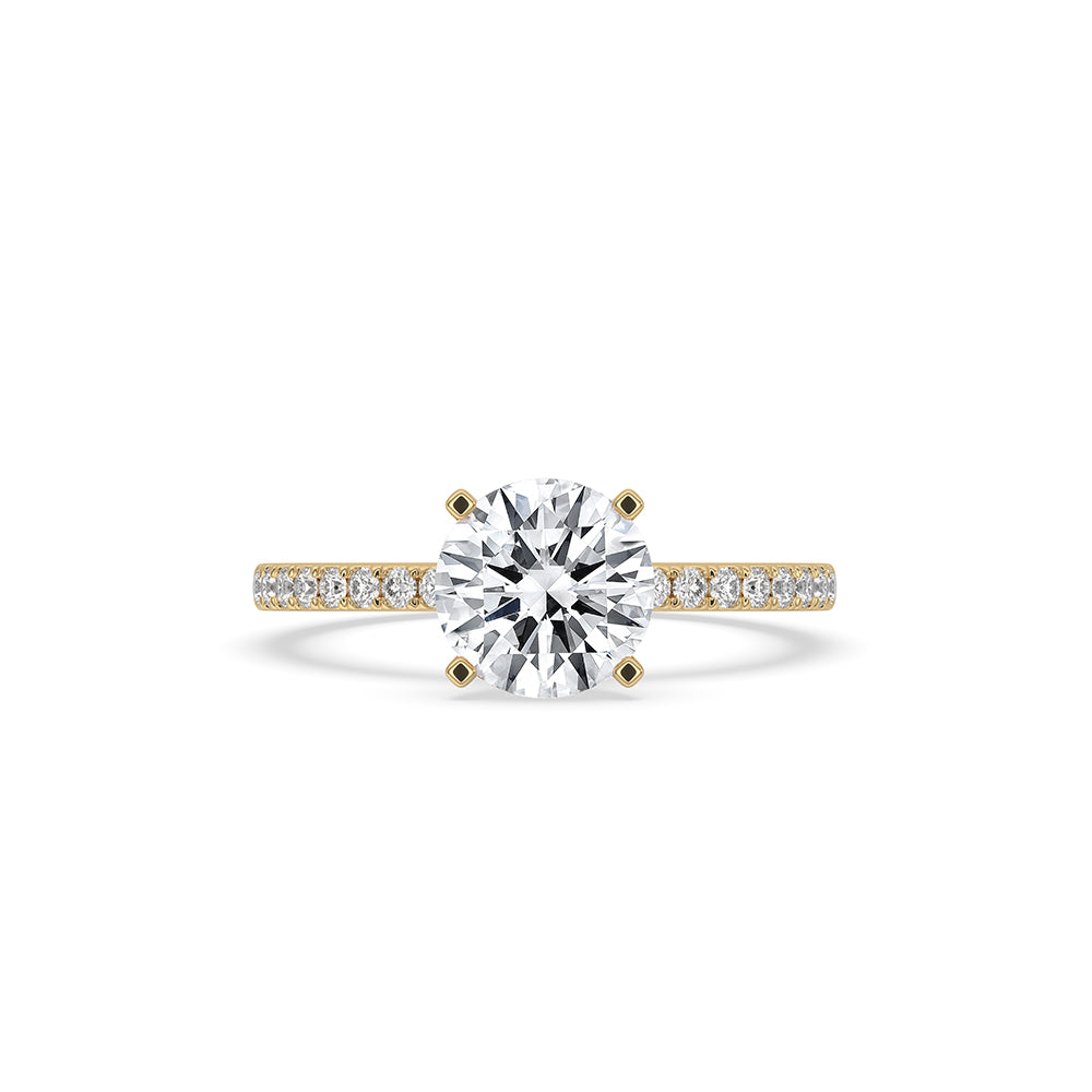 Round cut engagement ring with pave setting.
